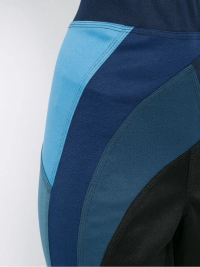 Shop À La Garçonne Panelled Flared Trousers In Blue