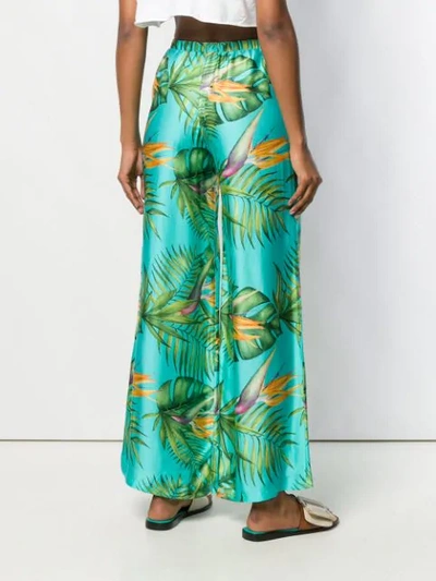 Shop Mc2 Saint Barth Flared Foliage Print Trousers In Green