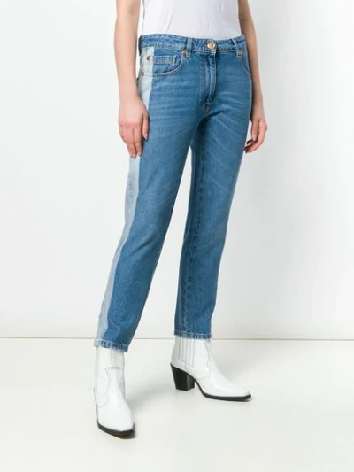 Shop Versace Contrast Stripe Jeans In Blue