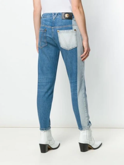 Shop Versace Contrast Stripe Jeans In Blue
