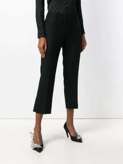 Shop Saint Laurent Cropped Slim Trousers In Black