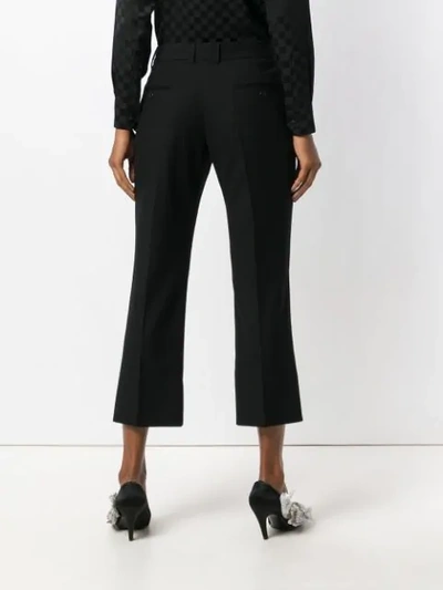 Shop Saint Laurent Cropped Slim Trousers In Black
