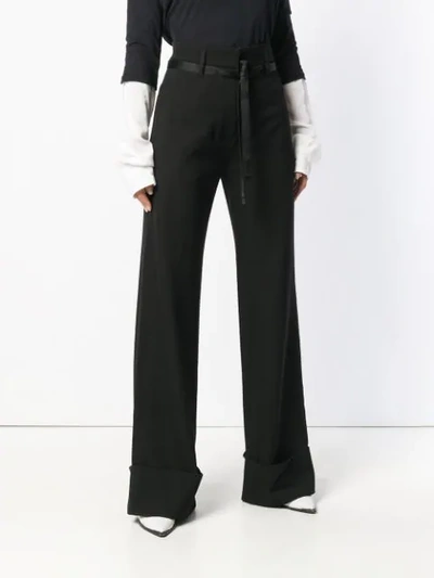 Shop Ann Demeulemeester Flared Tailored Trousers In 099 Black