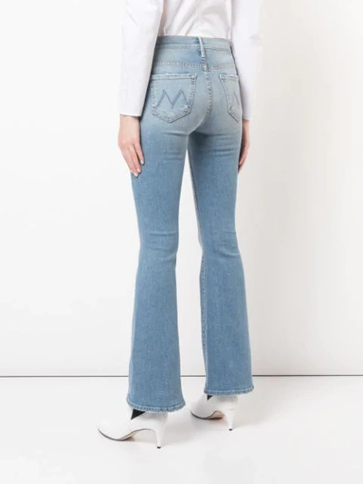 Shop Mother The Weekender Flared Jeans In Blue