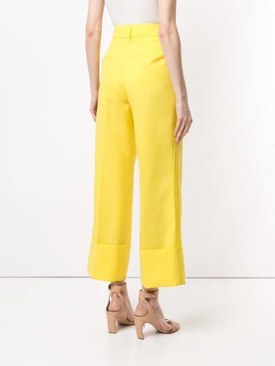 Shop Rochas Wide Leg Cropped Trousers In Yellow
