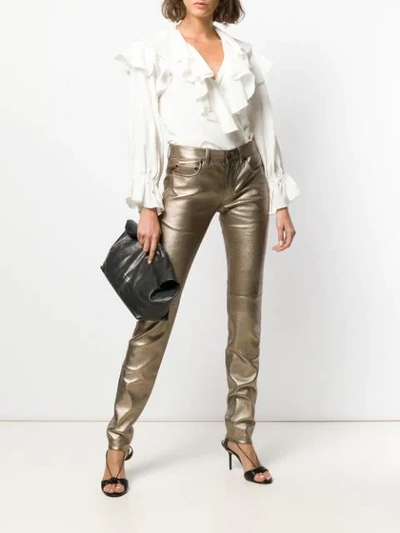 Shop Saint Laurent Metallic Skinny Jeans In Gold