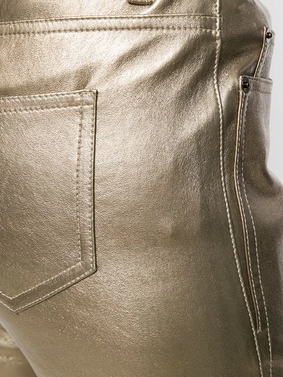 Shop Saint Laurent Metallic Skinny Jeans In Gold