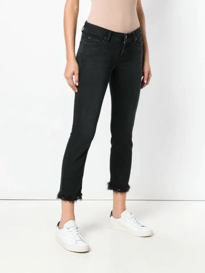 Shop Cambio Feather Hem Slim In Black