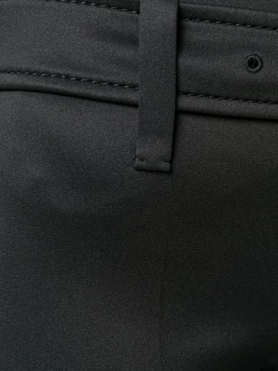 Shop Prada Wide Buckle Trousers In Black