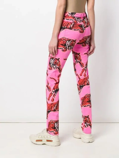 Shop Gucci Tiger Print Skinny Jeans In Pink