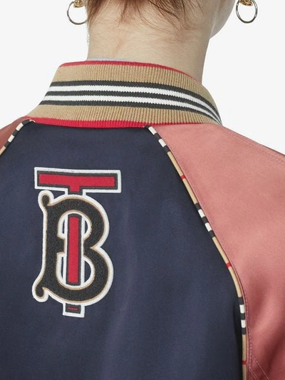 Shop Burberry Icon Stripe Detail Monogram Motif Bomber Jacket In Navy/pink