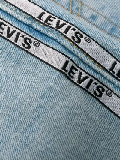 Shop Levi's Cropped Logo Stripe Jeans In Blue