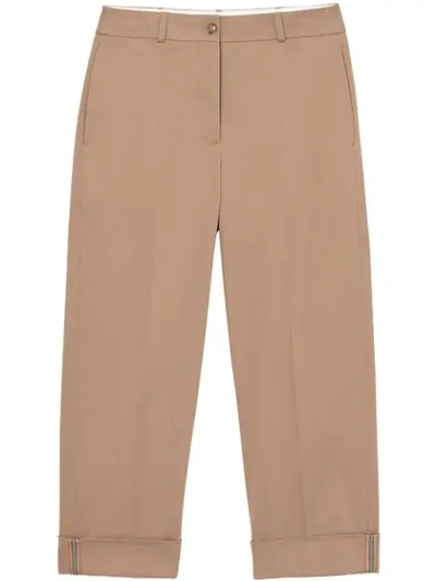 Shop Burberry Icon Stripe Detail Stretch Cotton Cropped Trousers In Brown