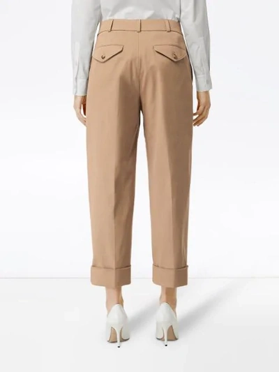 Shop Burberry Icon Stripe Detail Stretch Cotton Cropped Trousers In Brown