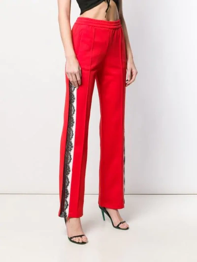 Shop Pinko Flared Track Trousers In Red