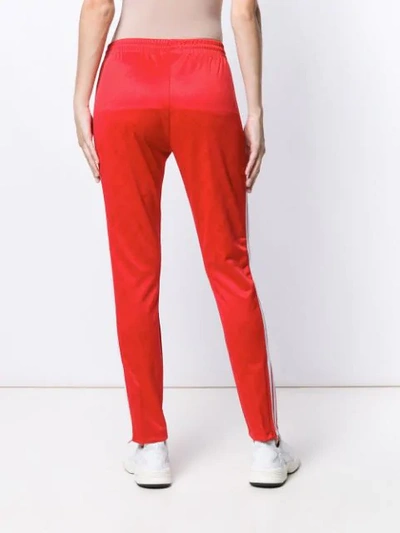 Shop Adidas Originals Side Stripe Track Pants In Red