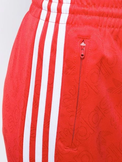 Shop Adidas Originals Side Stripe Track Pants In Red