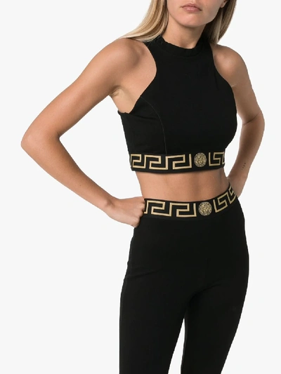 Shop Versace Greca Border Sports Bra In 101 - Black