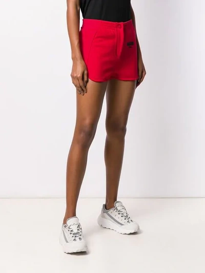 Shop Moschino Logo Print Track Shorts In Red