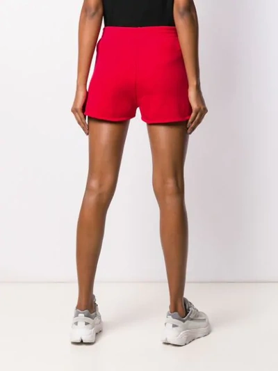 Shop Moschino Logo Print Track Shorts In Red