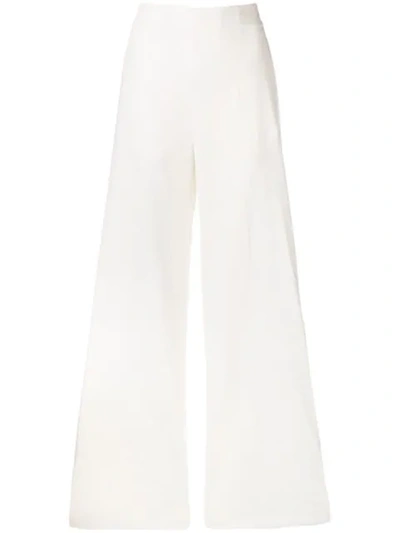 Shop Pinko Flared Tailored Trousers In White