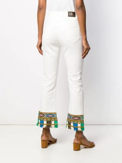 Shop Etro Embroidered Hem Jeans In White