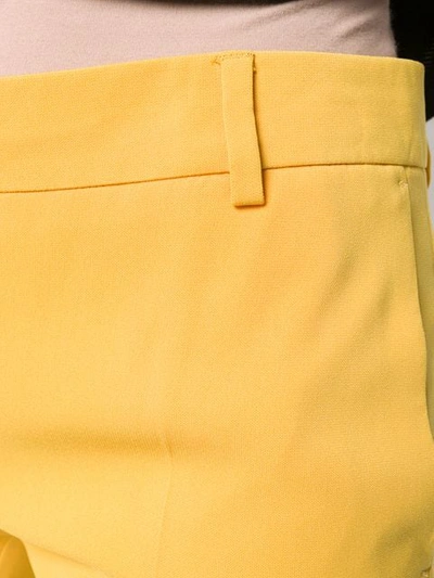 Shop Alberto Biani Creased Cropped Trousers In Yellow