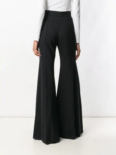 Shop Chloé Super Flare Trousers In 001 Black