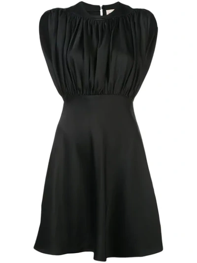 Shop Khaite Sleeveless Flared Dress In Black