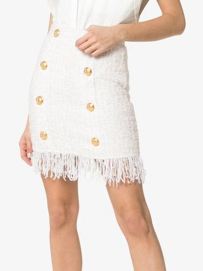 Shop Balmain Tweed Shredded Hem Gold Tone Button Skirt In White