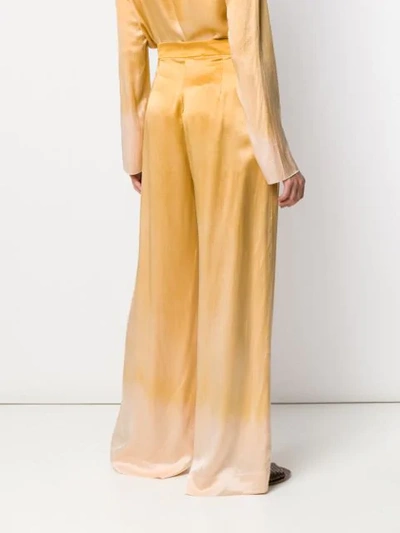 Shop Raquel Allegra Keaton Satin Trousers In Gold