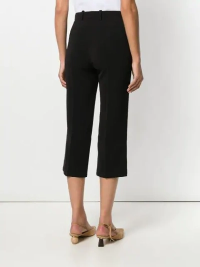 Shop Chloé Cropped Flared Trousers In Black