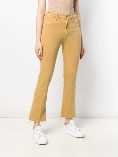 Shop Mother Cropped Bootcut Trousers In Yellow