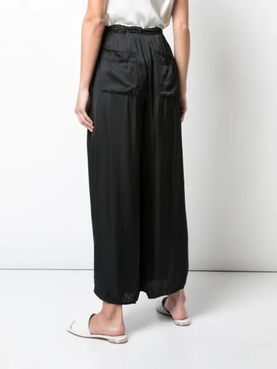 Shop Raquel Allegra Wide-leg Flared Trousers In Black