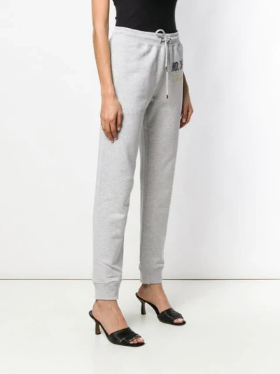 Shop Moschino Couture Embroidery Track Pants In Grey