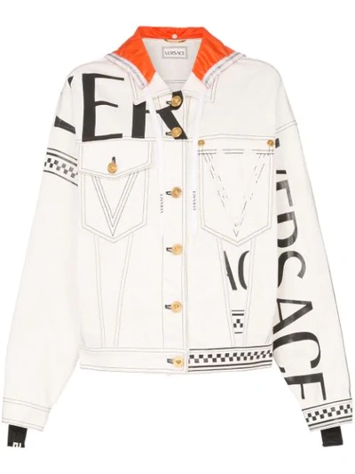 Shop Versace Logo Print Hooded Denim Jacket In White