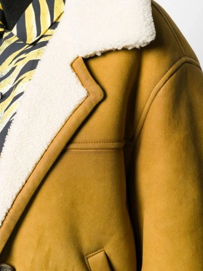 Shop Prada Buttoned Shearling Cropped Jacket In F0280 Giunco