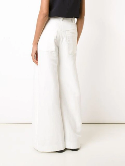 Shop Chloé Flared Trousers In White