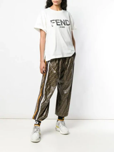Shop Fendi Logo Print Track Pants In Brown