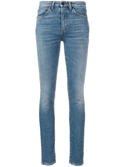 Shop Saint Laurent Stonewashed Skinny Jeans In Blue
