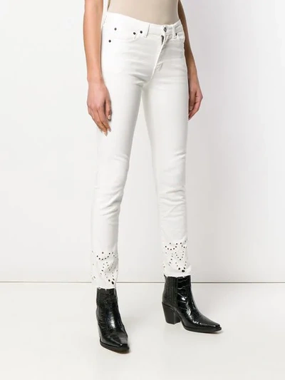 Shop Saint Laurent Decorative Perforations Skinny Jeans In White