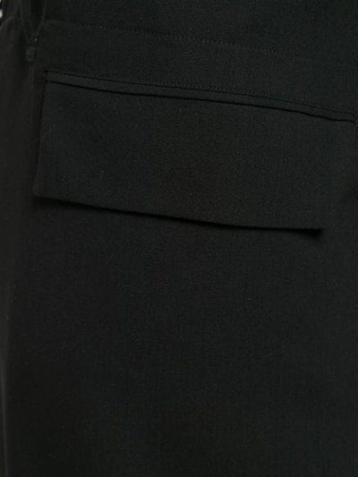 Shop Ann Demeulemeester Buckle Detail Trousers In Black