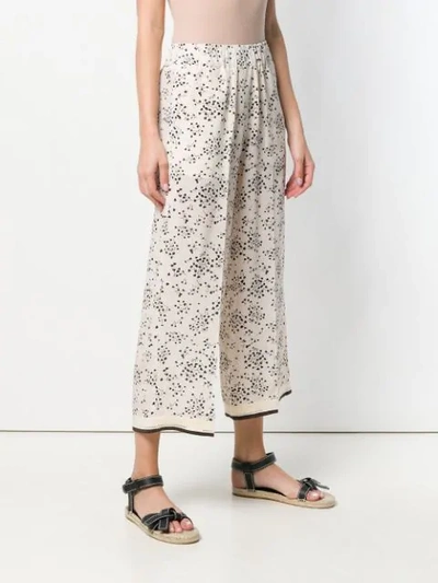Shop Alysi Small Floral Print Trousers - Neutrals