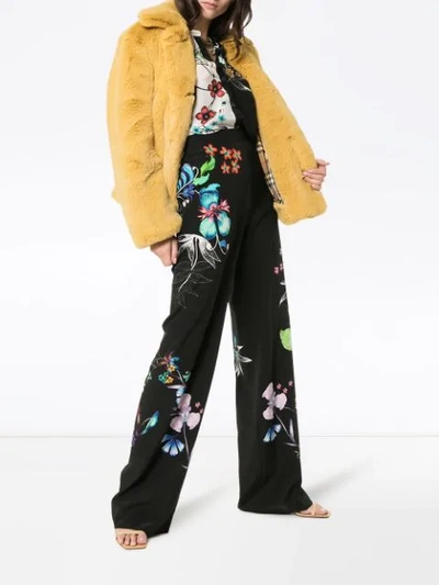 Shop Etro Wide Leg Floral Print Trousers In Black