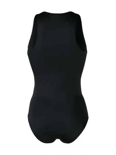 Shop Balmain Button Detailed Swimsuit In Black