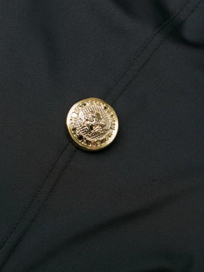 Shop Balmain Button Detailed Swimsuit In Black