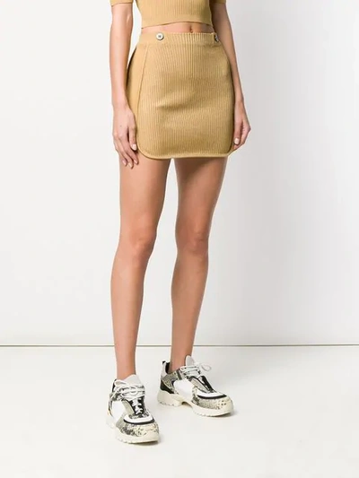 Shop Gcds Ribbed Mini Skirt In Gold