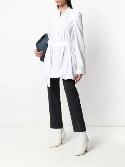 Shop Jw Anderson Flared Belted Shirt In White