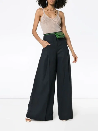 Shop Jacquemus High-waisted Trousers In Blue