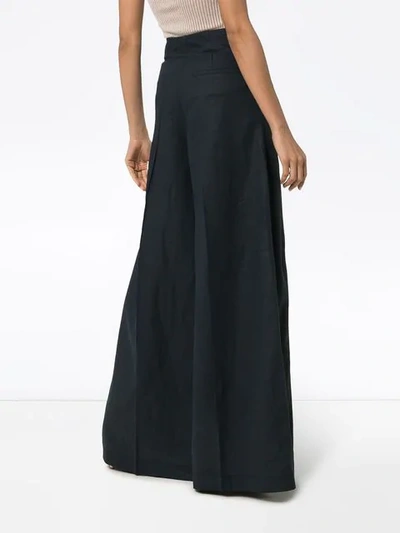 Shop Jacquemus High-waisted Trousers In Blue